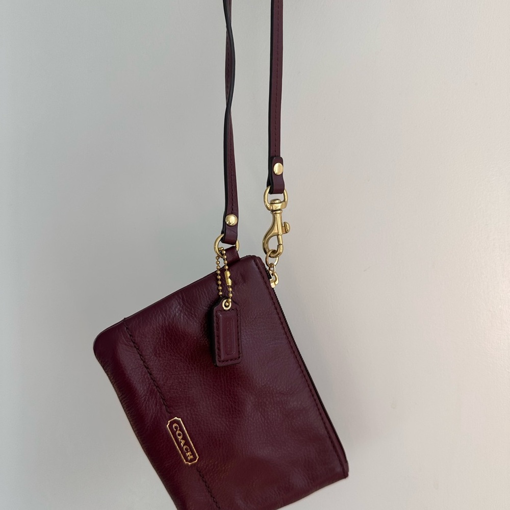 Coach burgundy leather wristlet